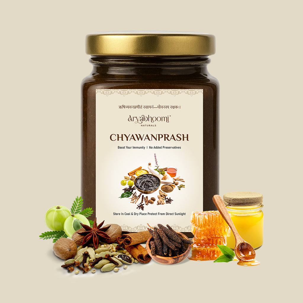 Jar of Arya Vaidya Chyawanprash with ingredients and honey on a beige background